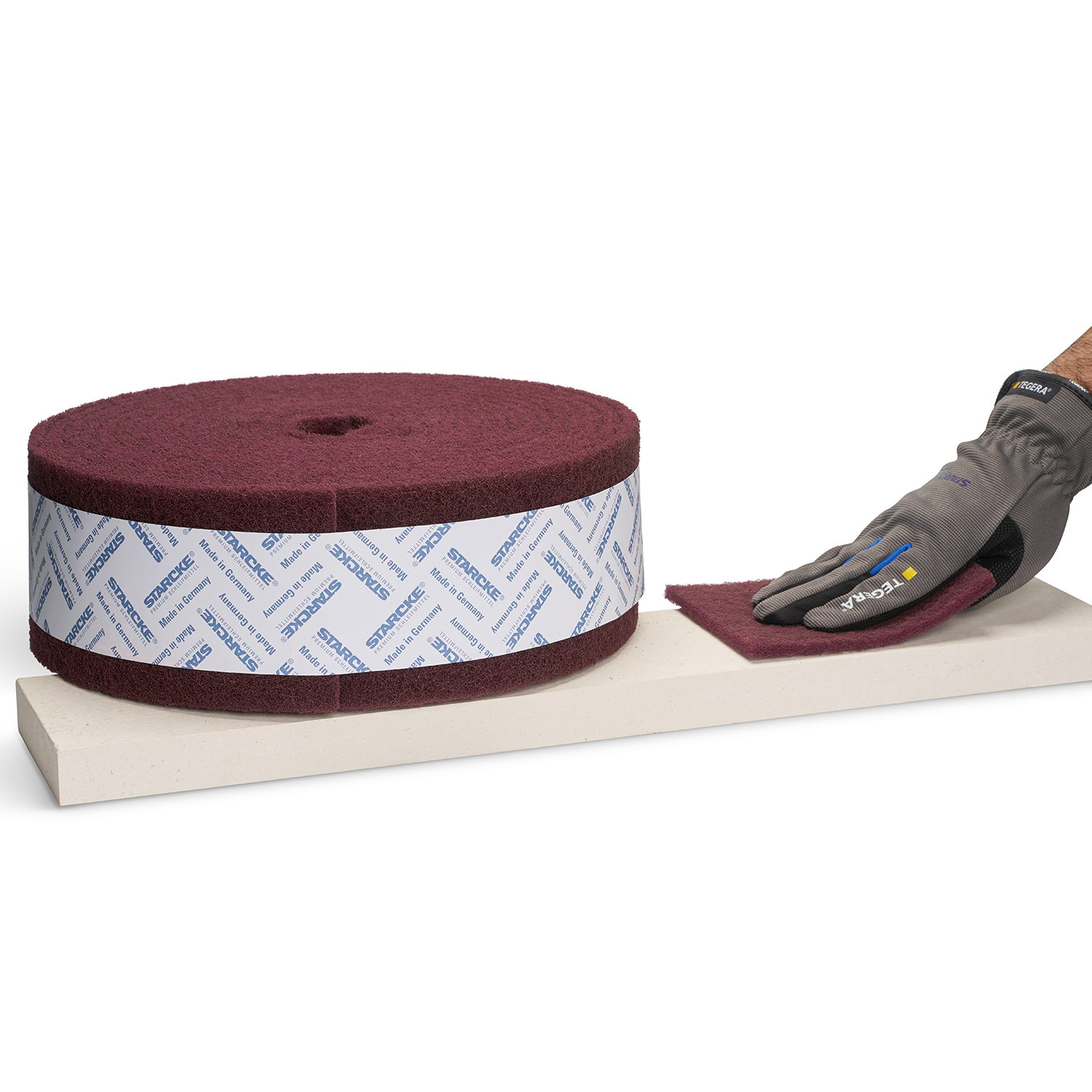 Rolle mit Banderole und schleifender Hand
